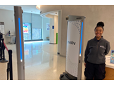 A security employee at Penn Medicine Radnor stands next to the Evolv weapons detection system. 